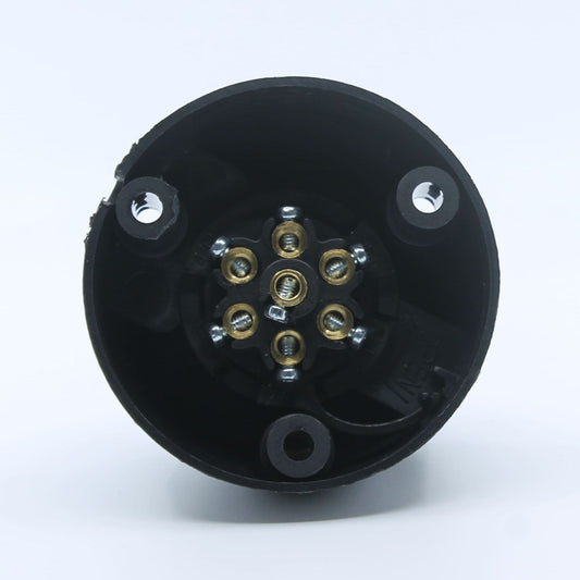 Conector eléctrico hembra (base) de 7 pines, fabricado en plástico, compatible con remolques y maquinaria agrícola.
